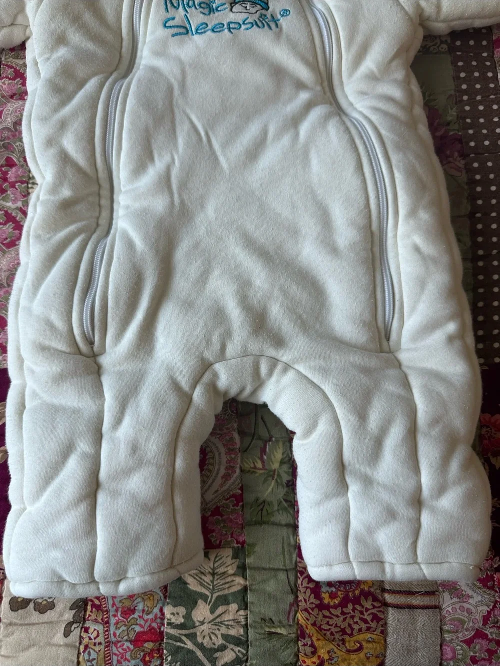 Baby Merlin’s Magic Sleepsuit Baby Onesie - Cream light yellow
